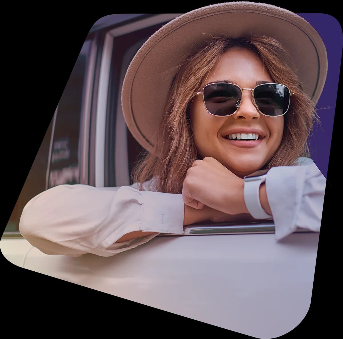 A relaxed traveler leaning out of the window of a Bonvia vehicle.